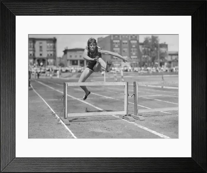 Framed Print : Mildred Didrickson Jumping Hurdles
