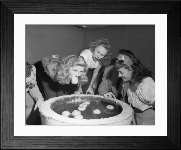 Framed Print : Teenagers Bobbing for Apples Framed Print : Teenagers Bobbing for Apples