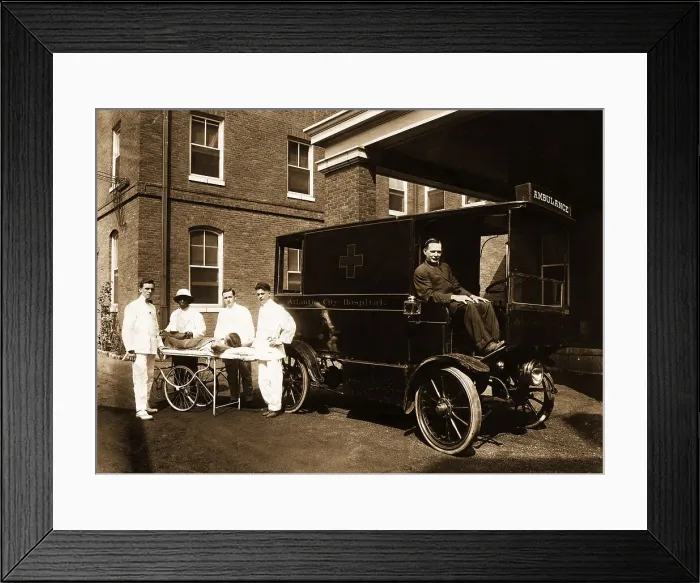 Framed Print : Ambulance and Driver with Hospital Employees at Hospital Entrance Framed Print : Ambulance and Driver with Hospital Employees at Hospital Entrance