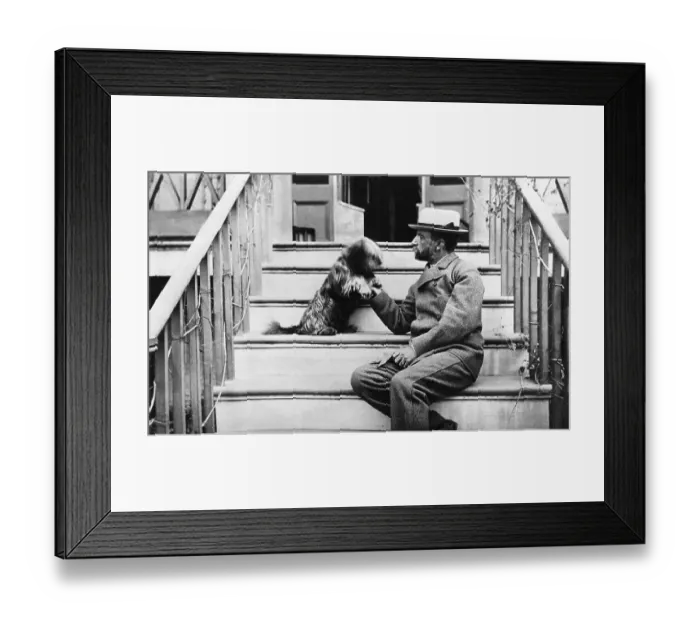 Framed Print : Henry Adams Playing with Dog on Porch Steps