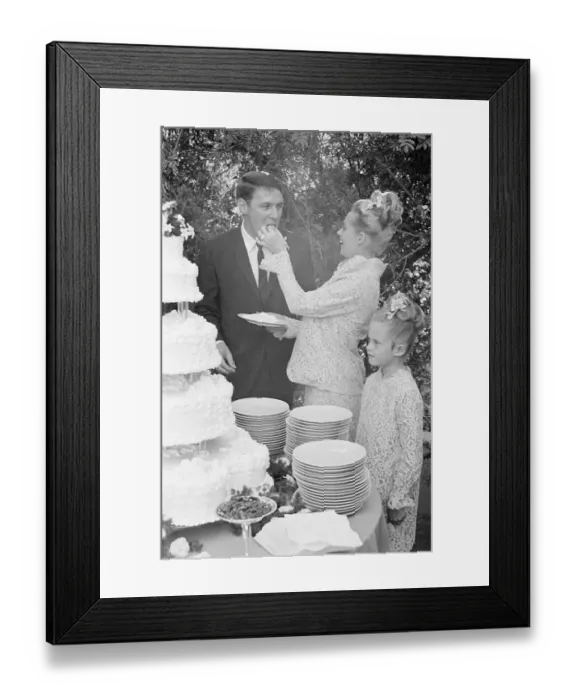 Framed Print : Tippi Hedren Feeding Her Husband Cake Framed Print : Tippi Hedren Feeding Her Husband Cake