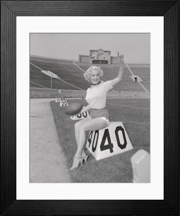 Framed Print : Mamie Van Doren Posing on Football Marker on The Field Framed Print : Mamie Van Doren Posing on Football Marker on The Field