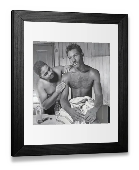 Framed Print : Jimmy Brown Examining Ezzard Charles Arm Framed Print : Jimmy Brown Examining Ezzard Charles Arm