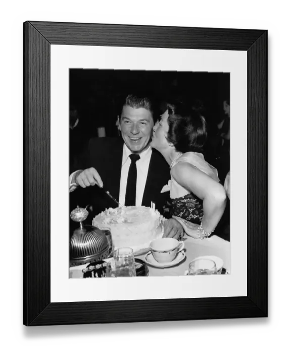 Framed Print : Ronald Reagan Cuts Birthday Cake Framed Print : Ronald Reagan Cuts Birthday Cake