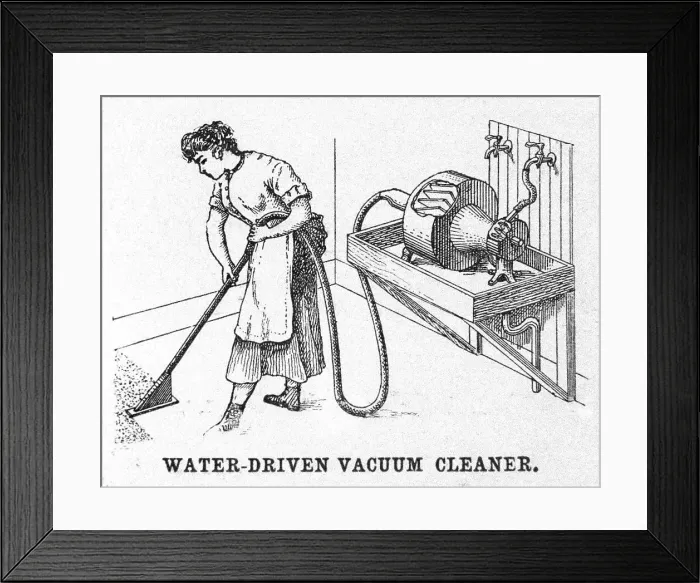 Framed Print : Woman Vacuuming Carpet Framed Print : Woman Vacuuming Carpet