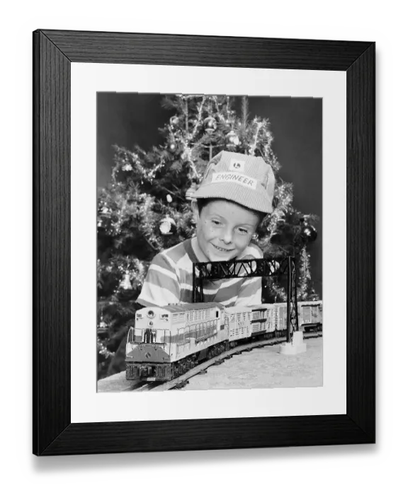 Framed Print : Boy Watching His Electric Train Framed Print : Boy Watching His Electric Train