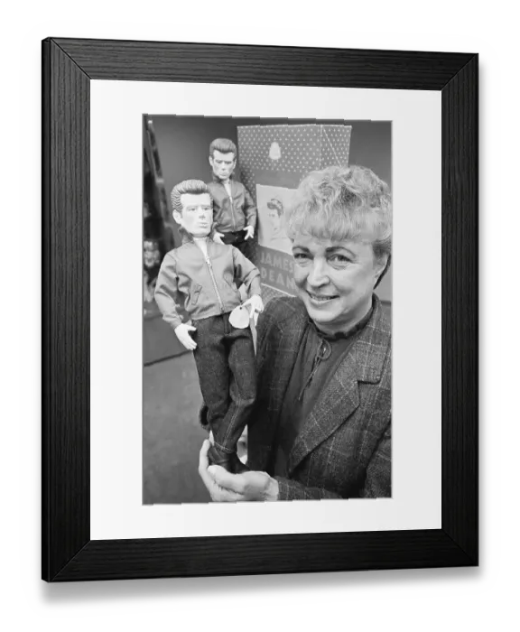 Framed Print : Waist-Up Woman Holds James Dean Doll