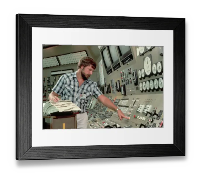 Framed Print : Nuclear Technician Reviews Book