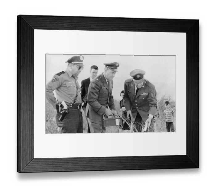 Framed Print : Lonnie Zamora Looks On As Major William Conner Uses A Geiger Counter Framed Print : Lonnie Zamora Looks On As Major William Conner Uses A Geiger Counter
