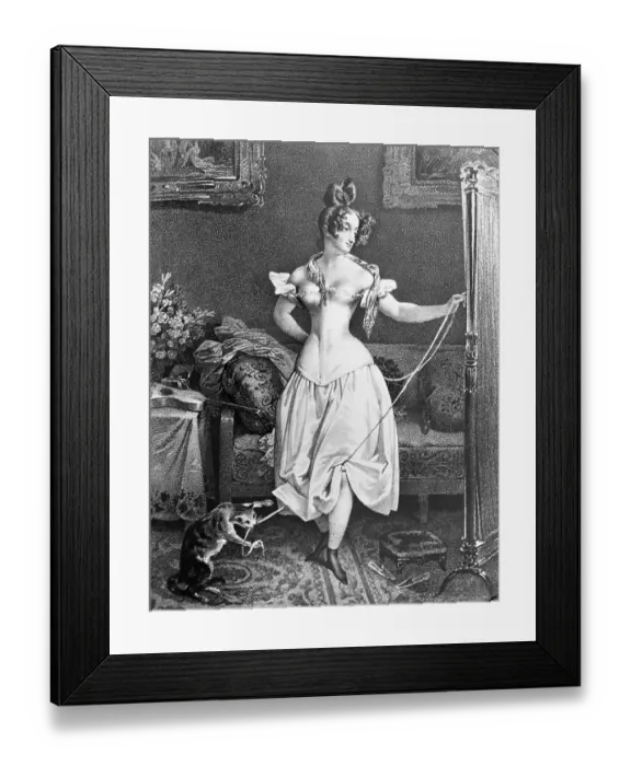 Framed Print : Woman in Corset with Cat Toying at Her Ribbon Framed Print : Woman in Corset with Cat Toying at Her Ribbon