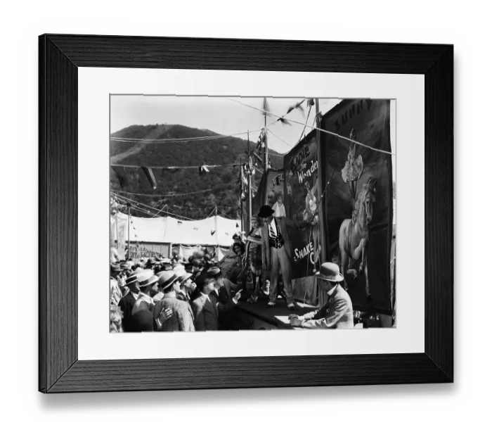 Framed Print : Sideshowman Selling Tickets to Men Framed Print : Sideshowman Selling Tickets to Men