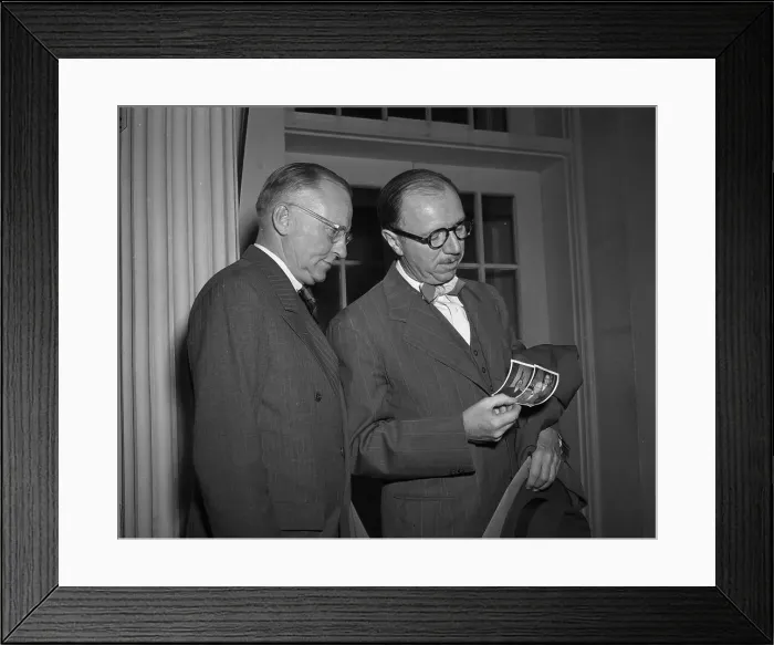 Framed Print : Truman Uses a Polariod Camera Framed Print : Truman Uses a Polariod Camera