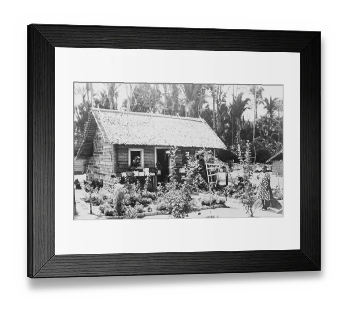 Framed Print : Woman Standing Outside a Cottage Framed Print : Woman Standing Outside a Cottage