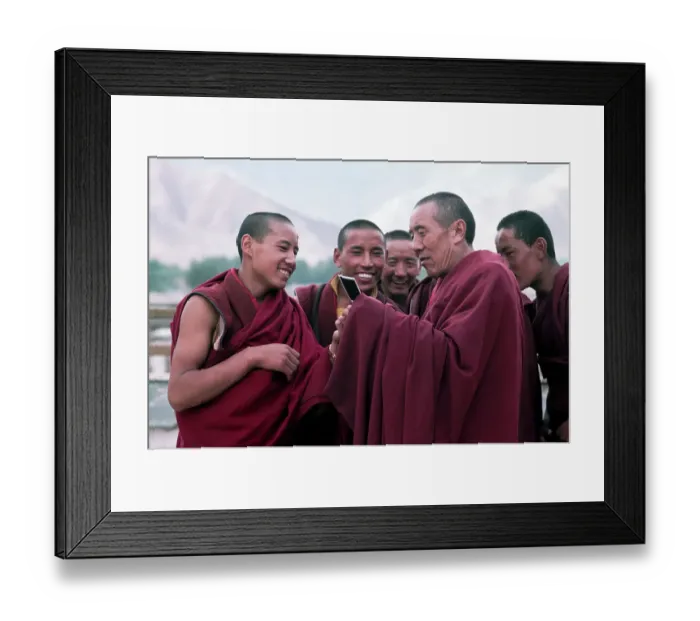 Framed Print : Tibetan Monks Looking At Polaroids Framed Print : Tibetan Monks Looking At Polaroids