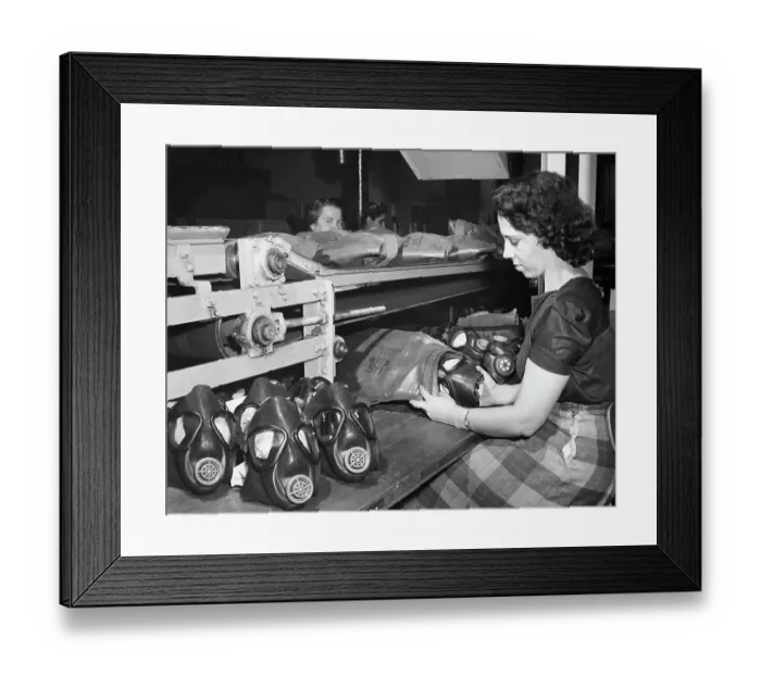 Framed Print : Woman Packing Assembled Rubber Gas Masks Framed Print : Woman Packing Assembled Rubber Gas Masks
