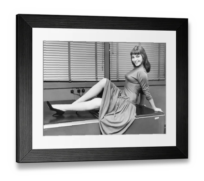 Framed Print : Joan Collins Posed Reclining on Desktop Framed Print : Joan Collins Posed Reclining on Desktop