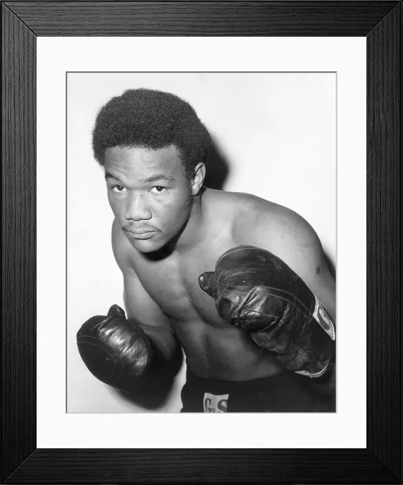 Framed Print : George Foreman In Waist-Up Punching Pose Framed Print : George Foreman In Waist-Up Punching Pose
