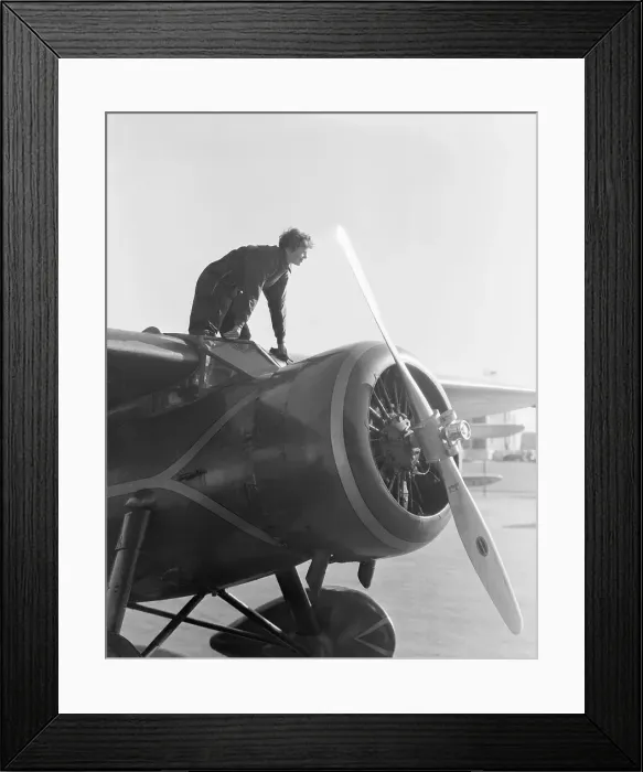 Framed Print : Amelia Earhart On Top Of Her Plane Framed Print : Amelia Earhart On Top Of Her Plane