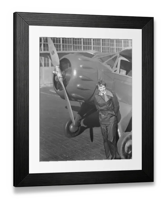 Framed Print : Amelia Earhart Stands By Plane Propeller Framed Print : Amelia Earhart Stands By Plane Propeller