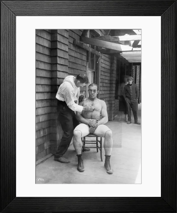 Framed Print : Man Rubbing James Jeffries Chest Framed Print : Man Rubbing James Jeffries Chest