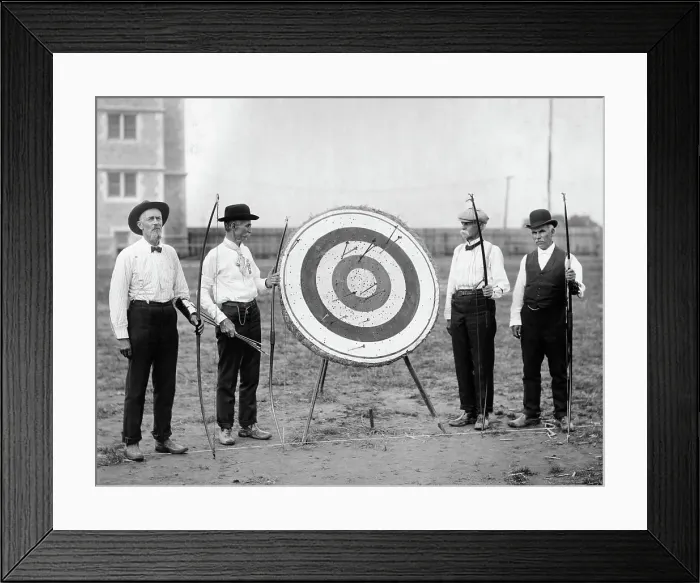 Framed Print : Archers Holding Bows Beside Target Framed Print : Archers Holding Bows Beside Target