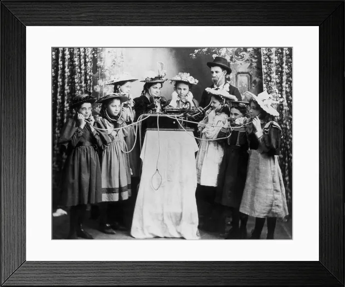 Framed Print : Family Listens To Radio Through Hedphone Framed Print : Family Listens To Radio Through Hedphone