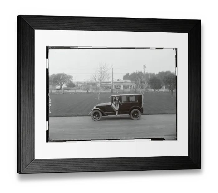 Framed Print : Madge Bellamy Posing in Front of a Car Framed Print : Madge Bellamy Posing in Front of a Car