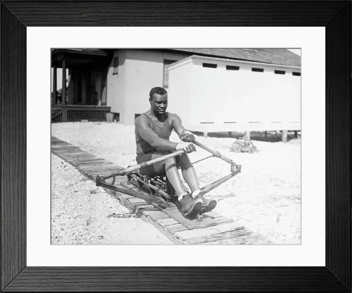 Framed Print : Man Practicing Rowing On A Machine Framed Print : Man Practicing Rowing On A Machine