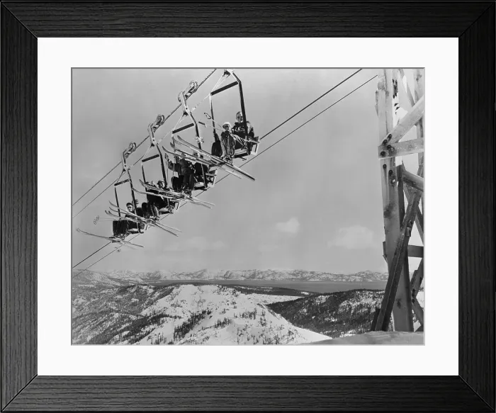 Framed Print : Skiers Riding Ski Lift Framed Print : Skiers Riding Ski Lift