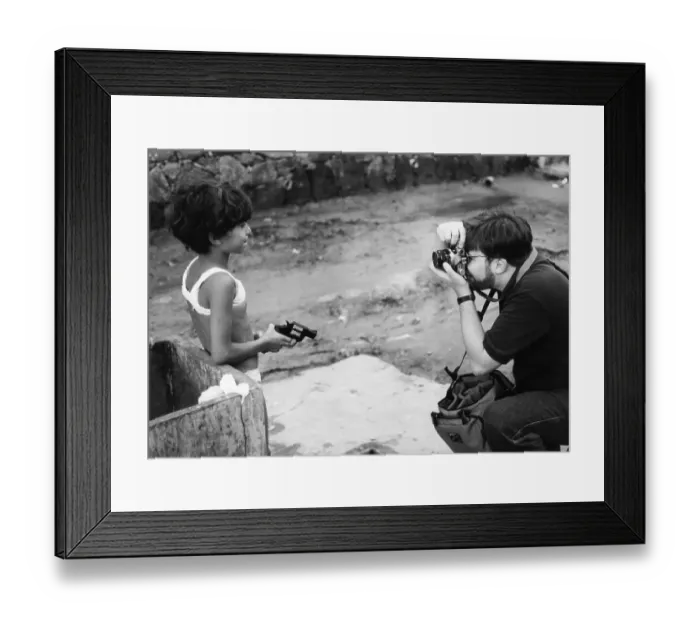 Framed Print : A Tourist Photographs a Small Girl Framed Print : A Tourist Photographs a Small Girl