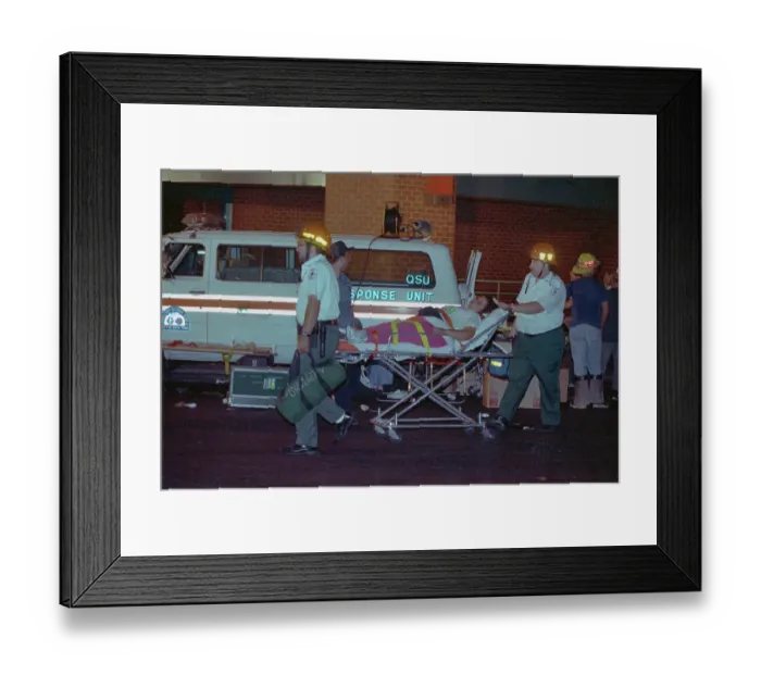 Framed Print : Rescue Workers Wheeling away Injured Passengers Framed Print : Rescue Workers Wheeling away Injured Passengers