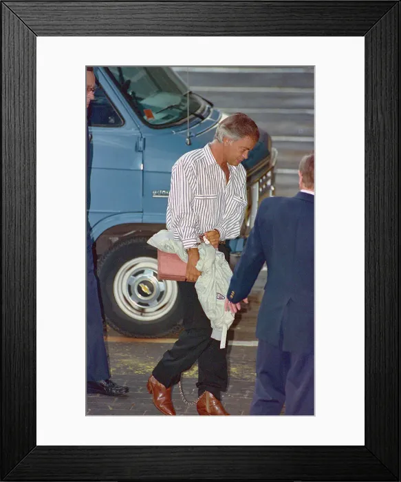 Framed Print : Jim Bakker Being Escorted to Court Framed Print : Jim Bakker Being Escorted to Court