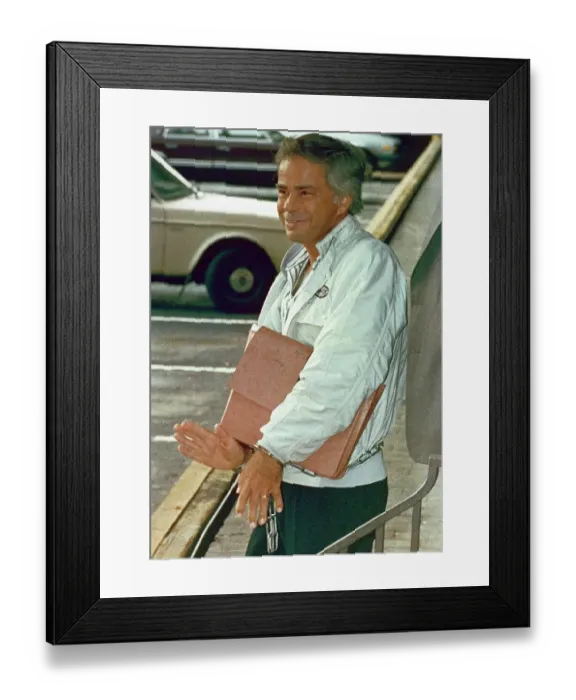 Framed Print : Jim Bakker Waving with Arms Chained Together