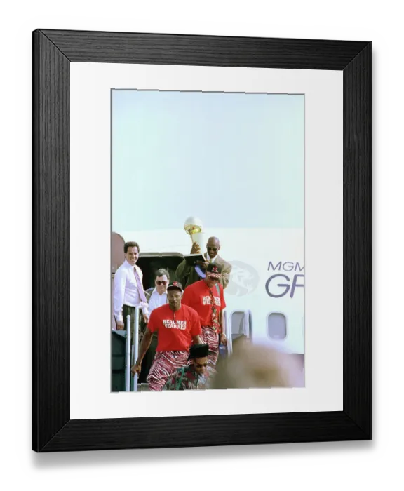 Framed Print : Michael Jordan Carrying Championship Trophy Framed Print : Michael Jordan Carrying Championship Trophy