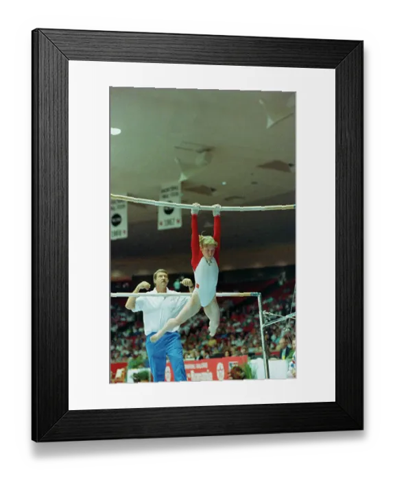 Framed Print : Coach Bela Karolyi Instructing Kim Zmeskal on Bars Framed Print : Coach Bela Karolyi Instructing Kim Zmeskal on Bars