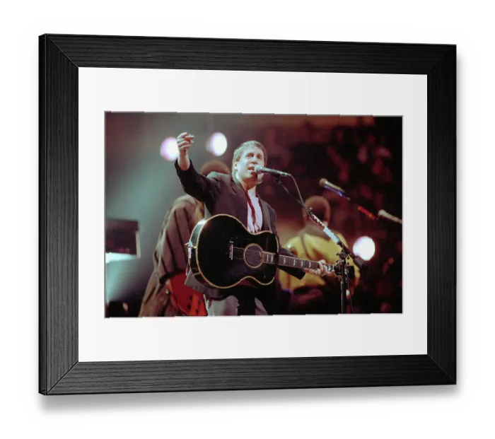 Framed Print : Paul Simon Singing on Stage