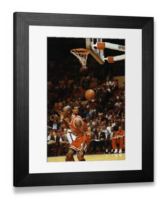 Framed Print : Michael Jordan Landing After Slam Dunking the Ball Framed Print : Michael Jordan Landing After Slam Dunking the Ball