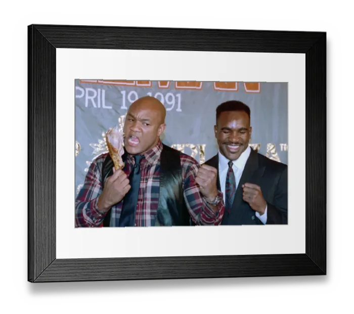 Framed Print : George Foreman and Evander Holyfield at a News Conference Framed Print : George Foreman and Evander Holyfield at a News Conference