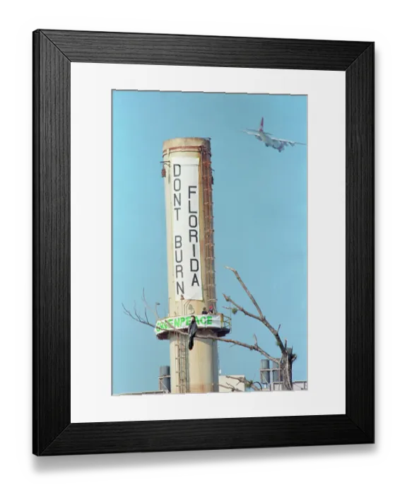 Framed Print : Greenpeace Banner On Smokestack Framed Print : Greenpeace Banner On Smokestack