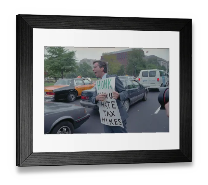 Framed Print : Man Holding Sign at Passing Motorists Framed Print : Man Holding Sign at Passing Motorists