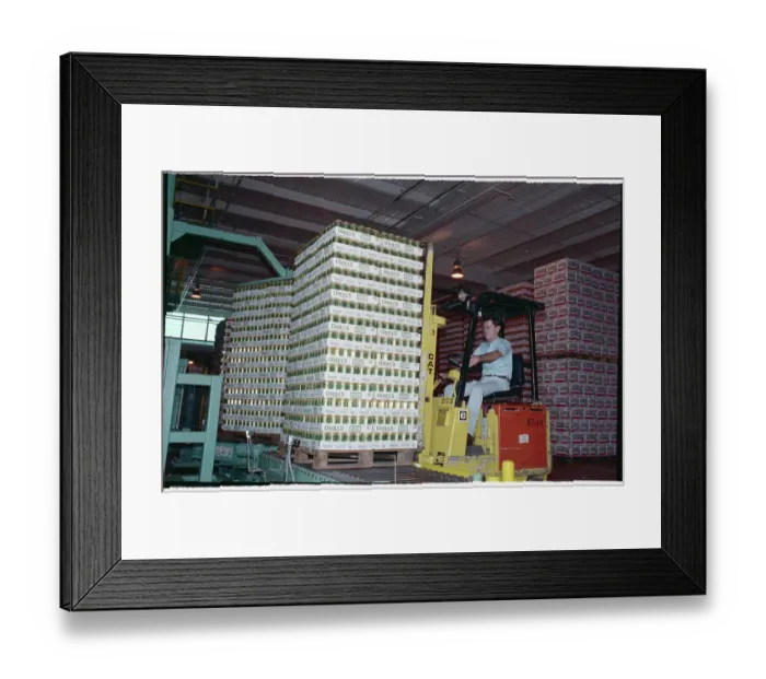 Framed Print : Corbett Caldwell Stacking Beer in Brewery Framed Print : Corbett Caldwell Stacking Beer in Brewery