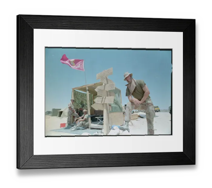 Framed Print : American Soldier Propped on Sign in Saudi Arabia Framed Print : American Soldier Propped on Sign in Saudi Arabia