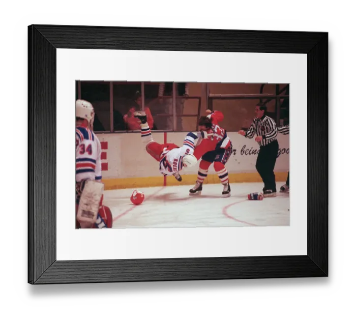 Framed Print : Dale Hunter Flipping Normand Rochefort to the Ice Framed Print : Dale Hunter Flipping Normand Rochefort to the Ice