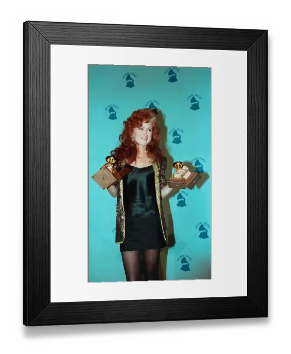 Framed Print : Bonnie Raitt Holding Grammy Awards Framed Print : Bonnie Raitt Holding Grammy Awards