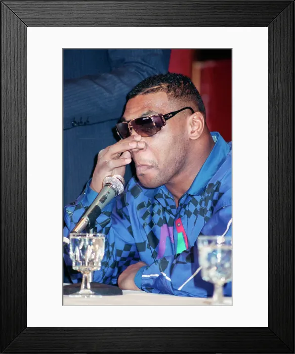 Framed Print : Mike Tyson Holding Nose Framed Print : Mike Tyson Holding Nose