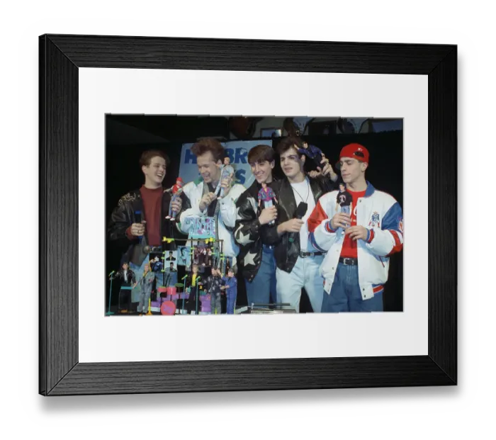 Framed Print : New Kids on the Block Holding Dolls Framed Print : New Kids on the Block Holding Dolls