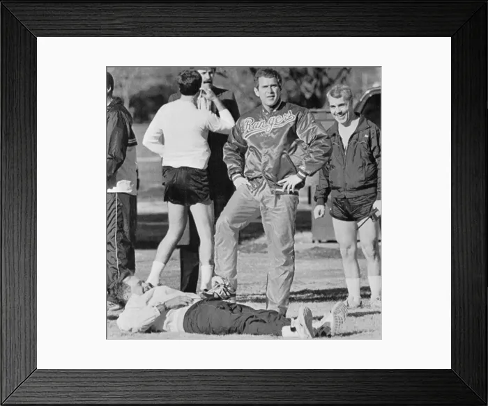 Framed Print : George W. Bush with Foot Resting on President George Bush Framed Print : George W. Bush with Foot Resting on President George Bush