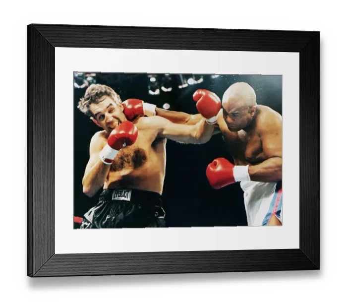 Framed Print : George Forman Punching Gerry Cooney Framed Print : George Forman Punching Gerry Cooney