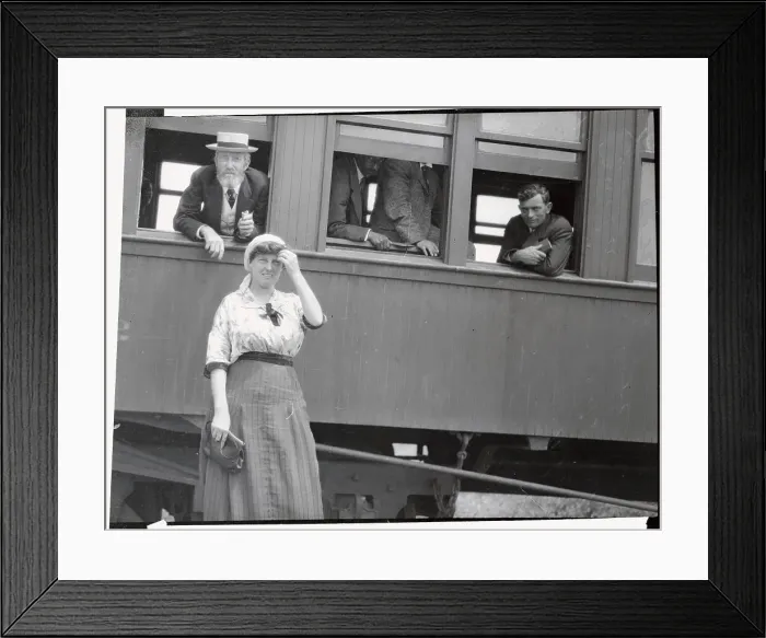 Framed Print : Young Woman Standing Near Train Window Framed Print : Young Woman Standing Near Train Window
