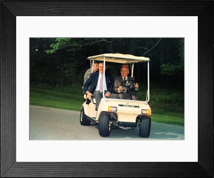 Framed Print : George Bush and Mikhail Gorbachev Riding in Golf Cart Framed Print : George Bush and Mikhail Gorbachev Riding in Golf Cart